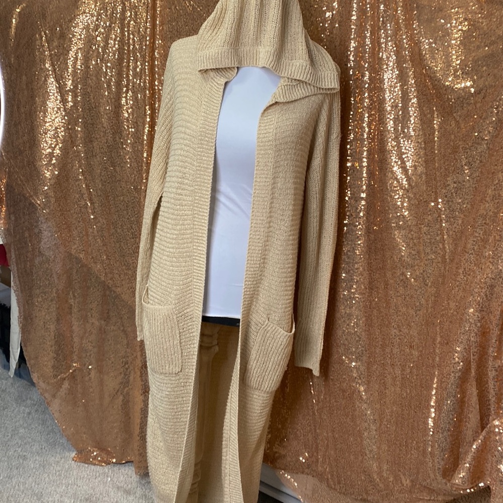 Pink Rose long cardigan with pockets & hood in a caramel knit material.